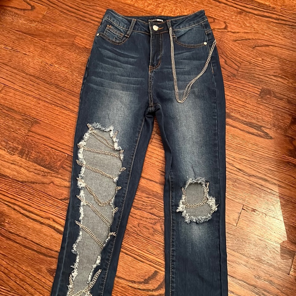 Jeans with silver chain accents